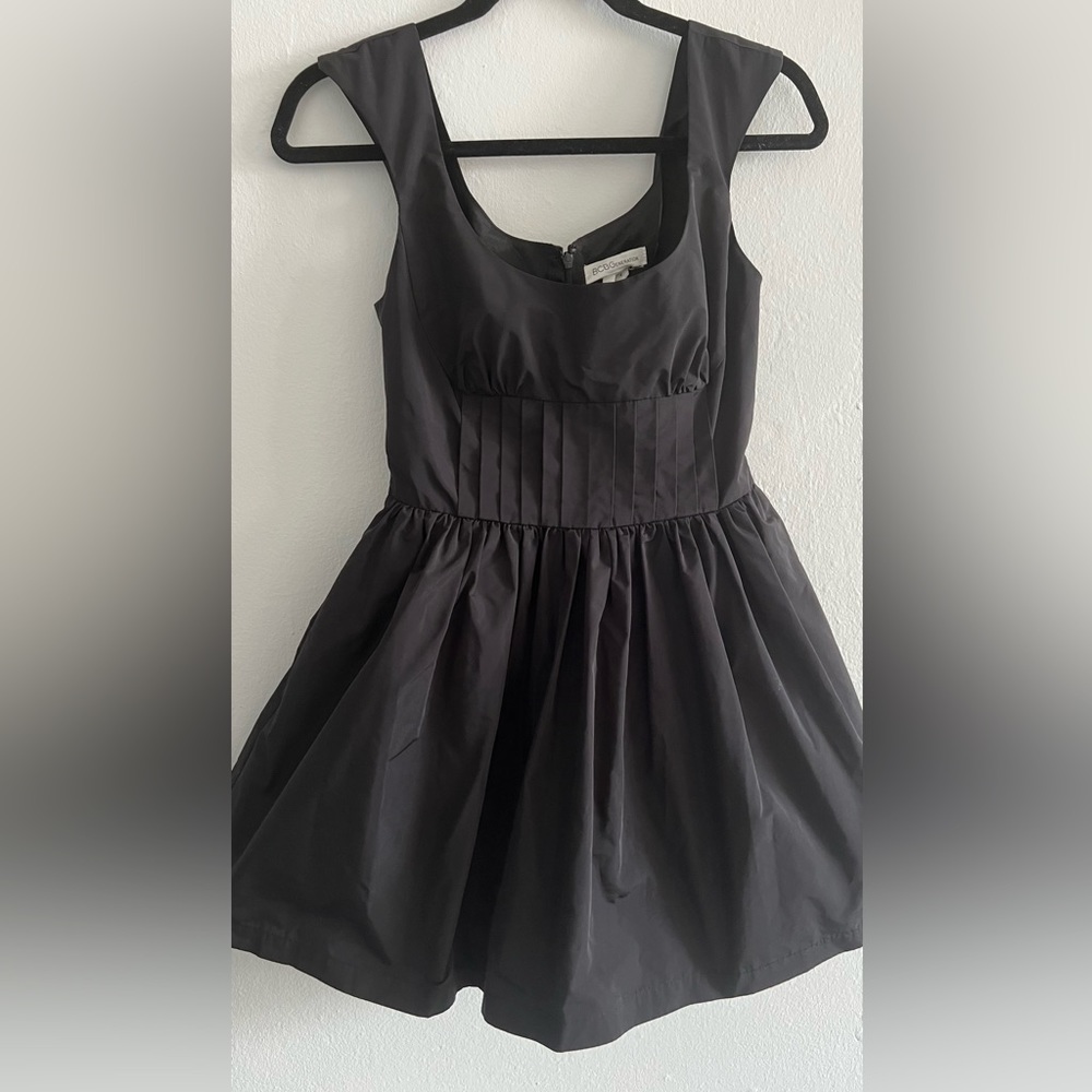 BCBG black dress with pants and pockets integrated